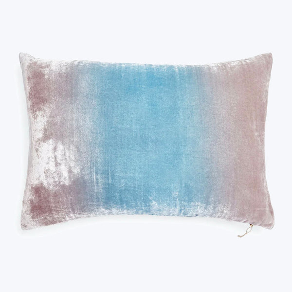 Rectangular pillow with gradient color design and soft velvet texture.