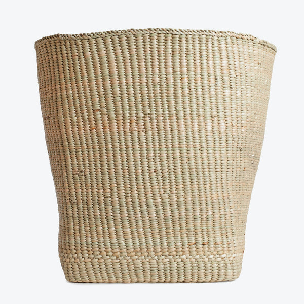 A sturdy, light-colored woven basket with a textured surface.