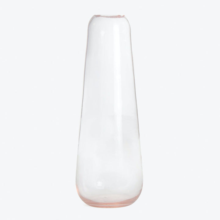 Minimalist clear glass vase with a subtle pinkish hue at base.