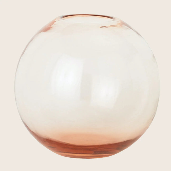 Transparent glass vase with a pink gradient, showcased on white background.