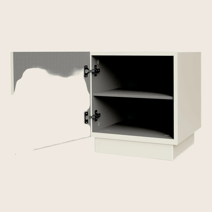 Modern beige storage cabinet with one open door and shelf.
