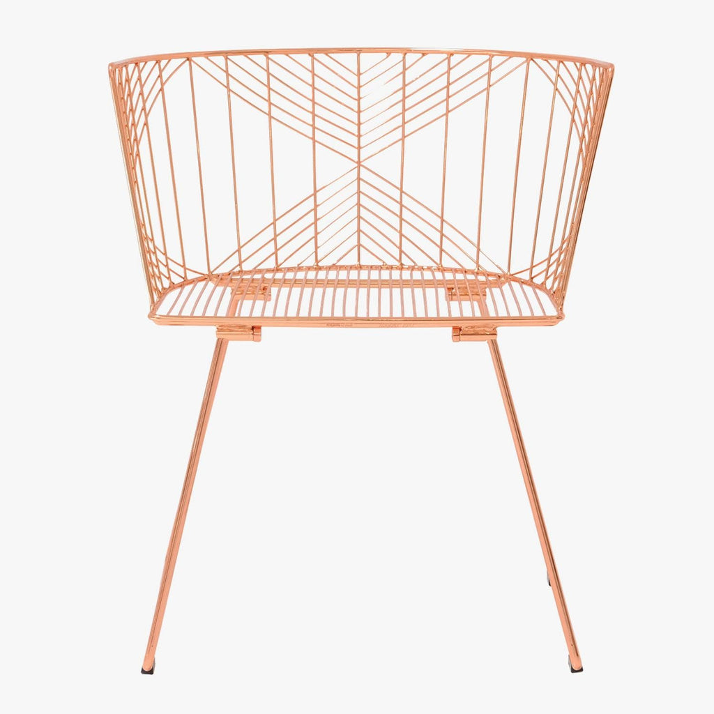 Minimalist modern chair with geometric metal design creates stunning statement