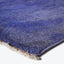 Close-up of plush blue rug with gradation of tones.