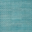 Repetitive geometric pattern in teal, with intricate diamond motifs inside.
