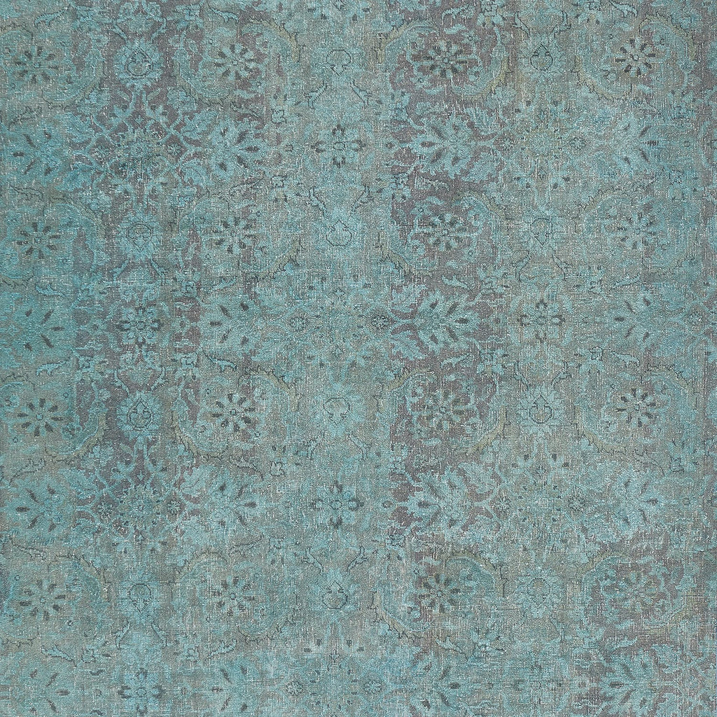 Vintage-inspired, floral medallion pattern on a textured, distressed surface.