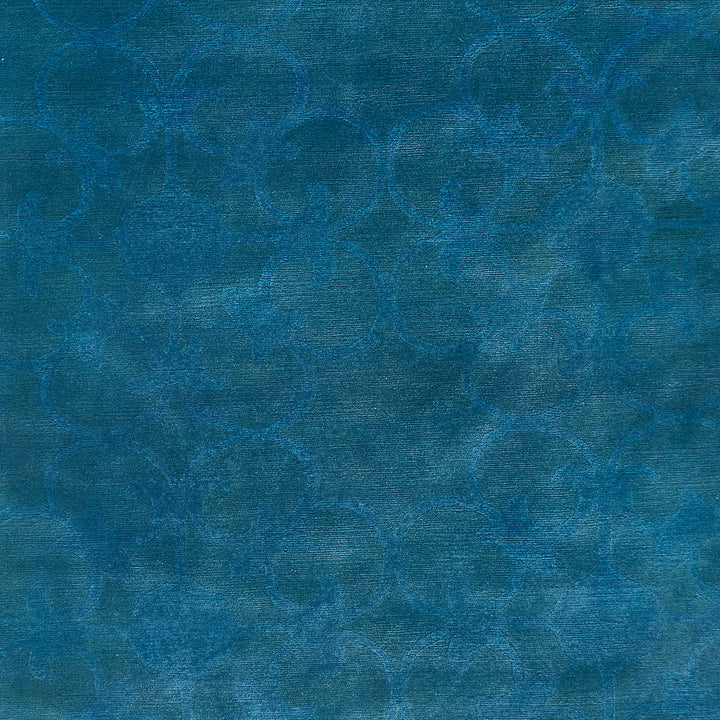 An intricate, textured pattern in varying shades of blue.