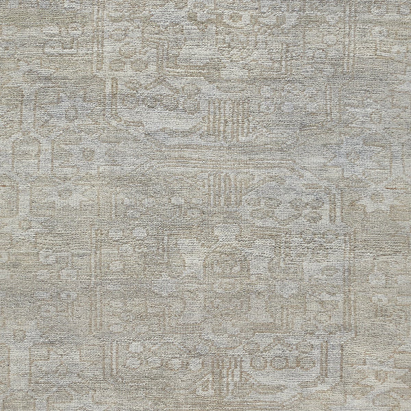 Close-up view of a minimalist textured fabric with geometric pattern.
