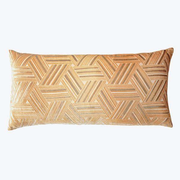 Rectangular decorative pillow with interlocking diagonal stripe pattern in muted tones.