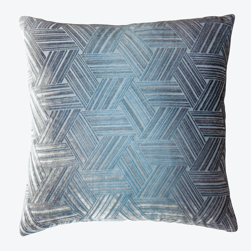 Square decorative pillow showcasing a dynamic blue geometric pattern.
