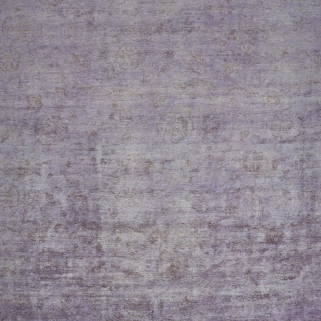An aged purple fabric with faded circular patterns throughout.