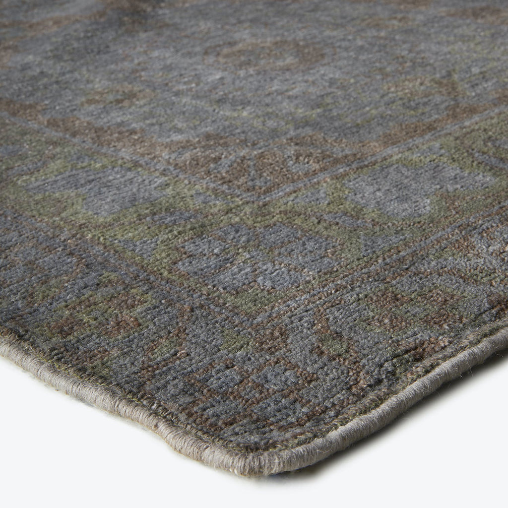 Close-up of a modern rug with plush texture and geometric pattern
