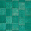 Vibrant green tiles form a captivating quilted fabric-like pattern.