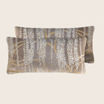 Soft and decorative rectangular throw pillow with muted plant design.