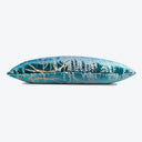 Eye-catching teal bolster pillow with embroidered plant motifs adds style