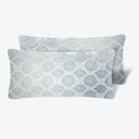 Soft pastel pillows with ornamental quatrefoil pattern for home decor