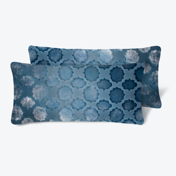 Stylish and artistic rectangular pillows with a soothing blue pattern.