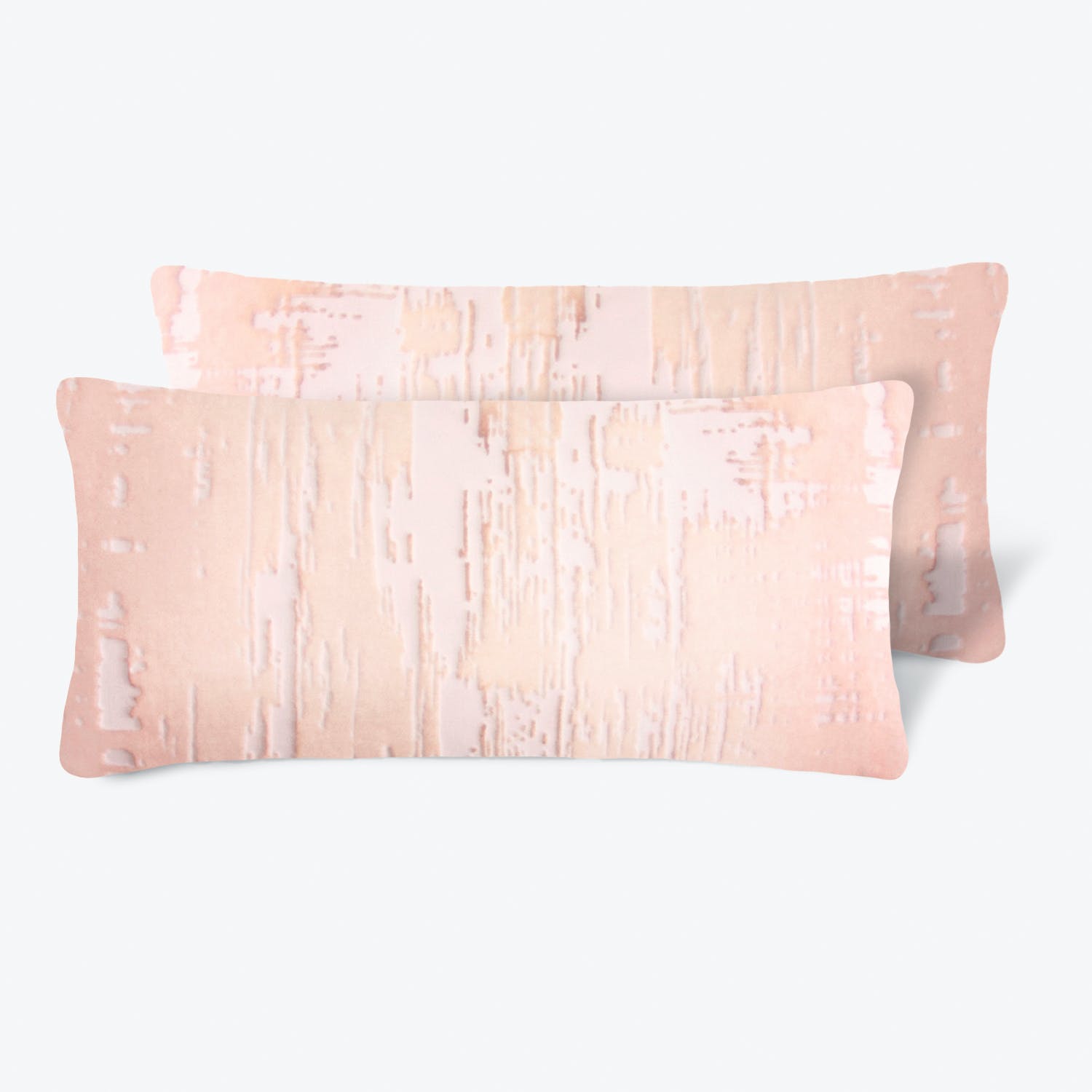 Textured blush pink throw pillows with rustic distressed pattern.