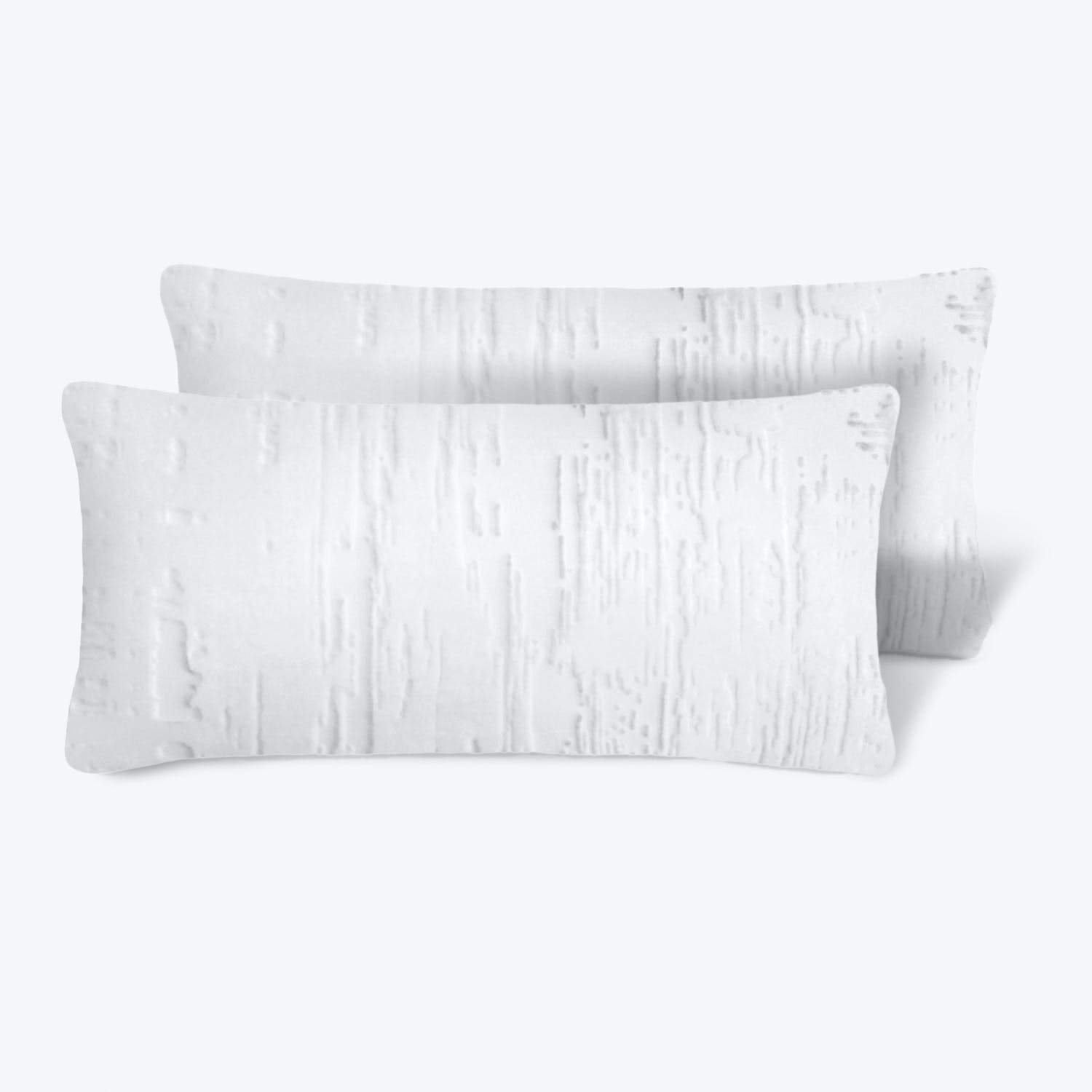 Minimalistic rectangular pillows with textured brush stroke pattern in white.