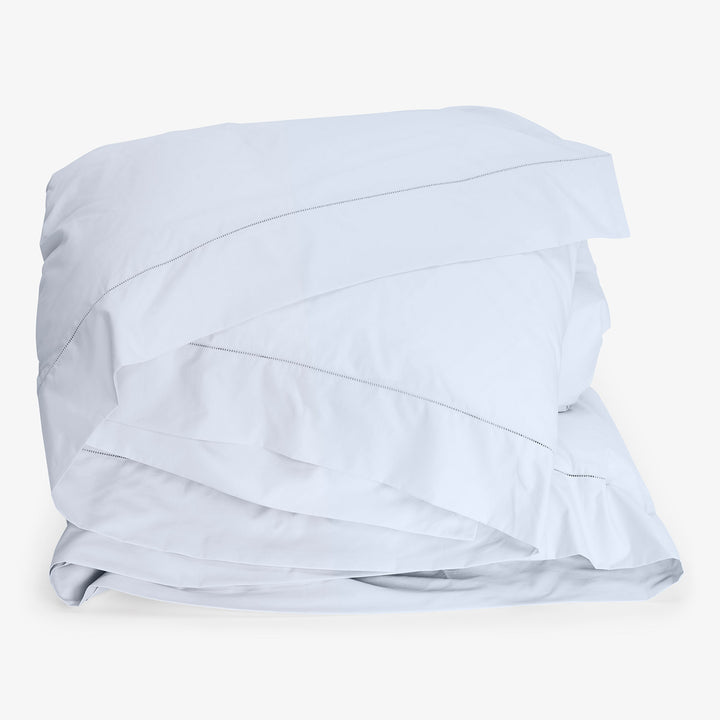 Crisp and pristine white duvet set showcasing clean and simple design.
