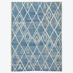Rich blue rectangular rug with white diamond lattice pattern