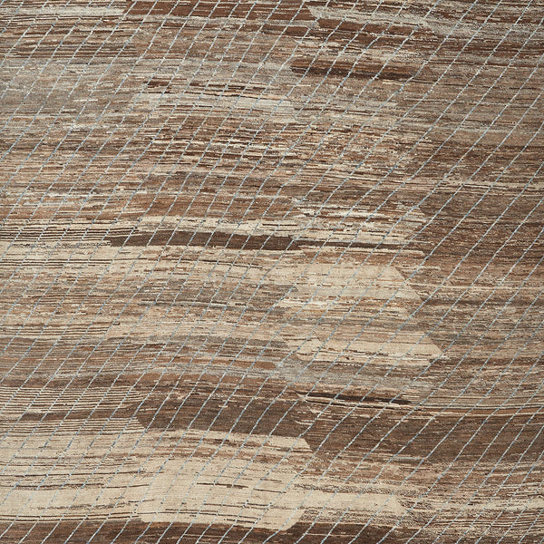 Close-up of a crosshatch pattern on a rough surface.