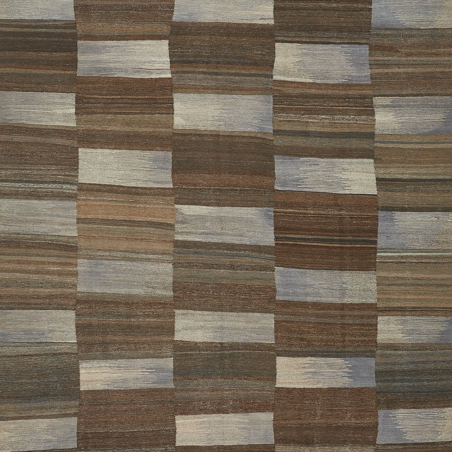 Close-up of coarse woven textile with alternating dark and light stripes.