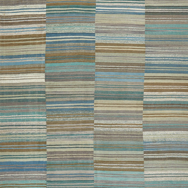 Patterned textile with horizontal stripes in earthy tones and pops of muted blues and greens.