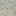 Abstract, mosaic-like pattern of irregular shapes in neutral tones.