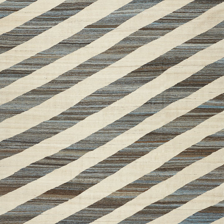 Patterned textile with diagonal striped design adds modern flair.