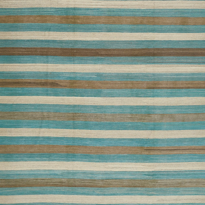 Striped fabric pattern with alternating shades of blue, teal, and brown.
