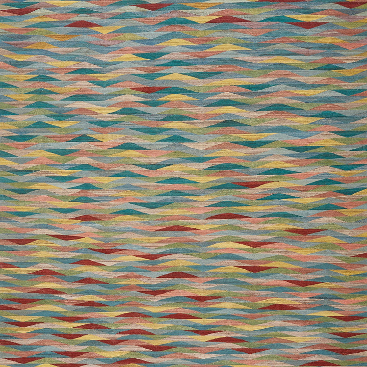 Vibrant and dynamic abstract textile with wavelike motifs and colors.