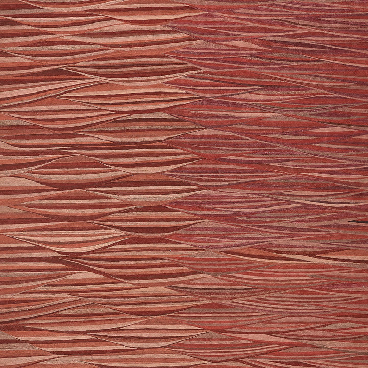 Close-up of a vibrant herringbone pattern with diagonal lines.