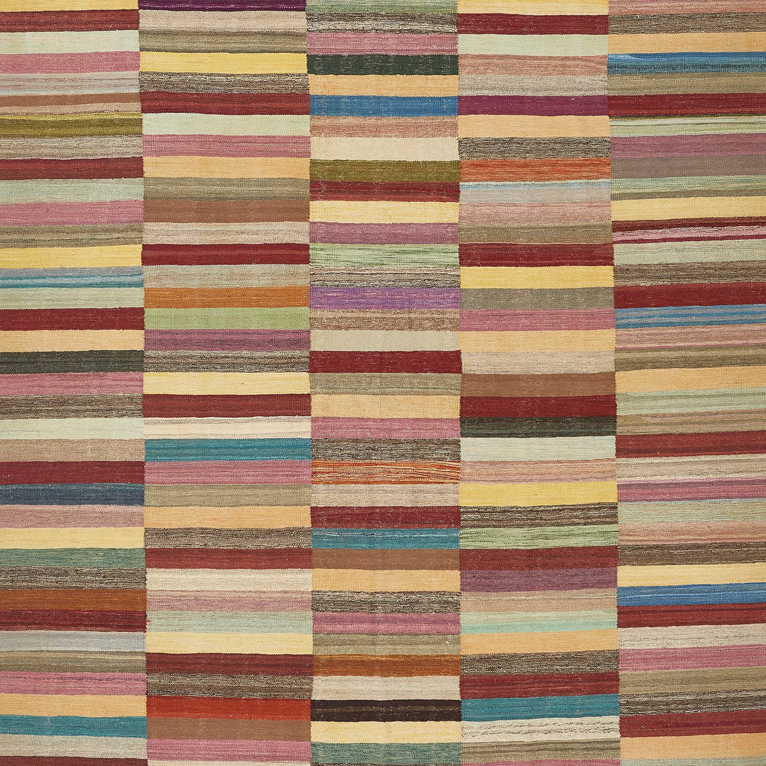 Vibrant, handwoven textile with intricate striped pattern and diverse colors.