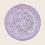 Abstract artwork by J. Queen showcases textured purple hues in circular form