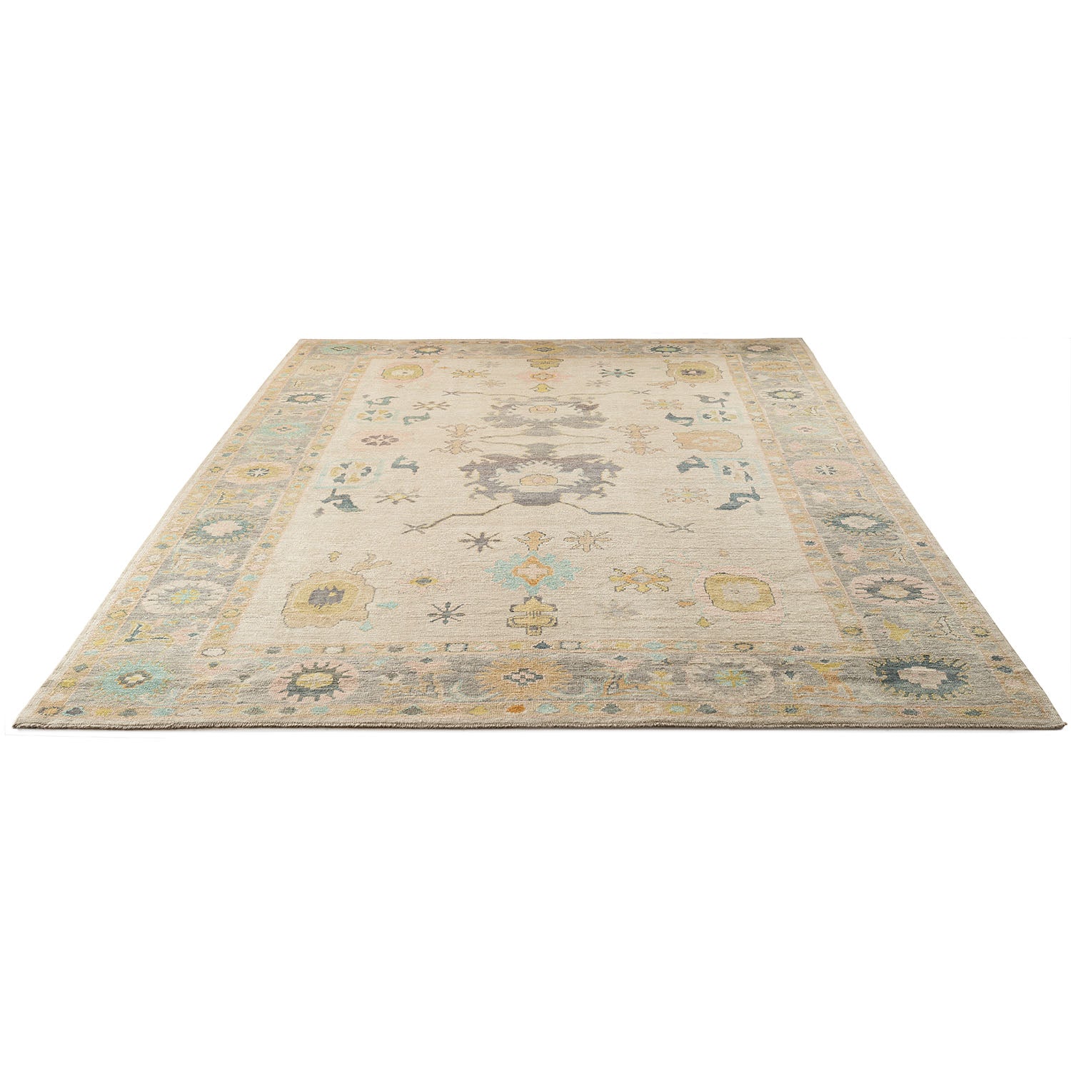 Vintage rectangular area rug with traditional patterned design in muted tones.