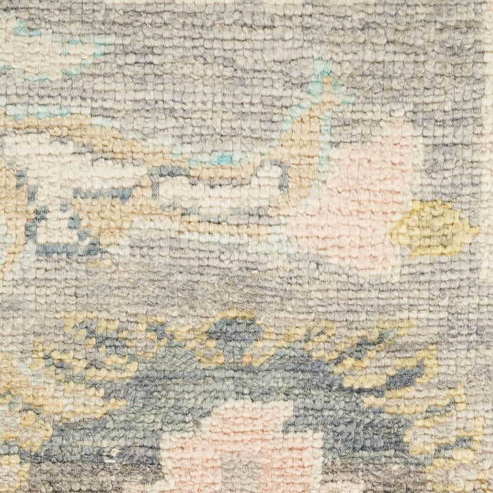 Close-up of a woolen rug showcasing intricate floral design