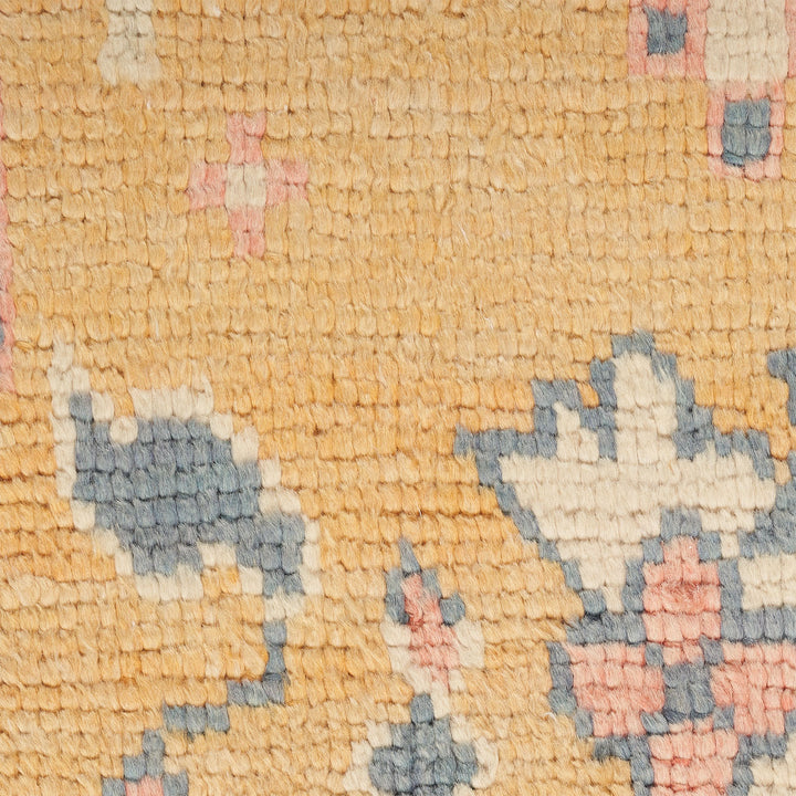 Intricate, colorful woven fabric showcases skilled craftsmanship in textile design.