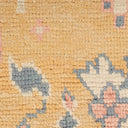 Intricate, colorful woven fabric showcases skilled craftsmanship in textile design.