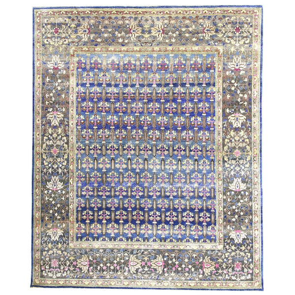 Exquisite hand-knotted rug with intricate floral motifs and vibrant colors.