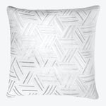 Square pillow with herringbone pattern in monochromatic shades of white and light gray, adding elegance and texture to any space.