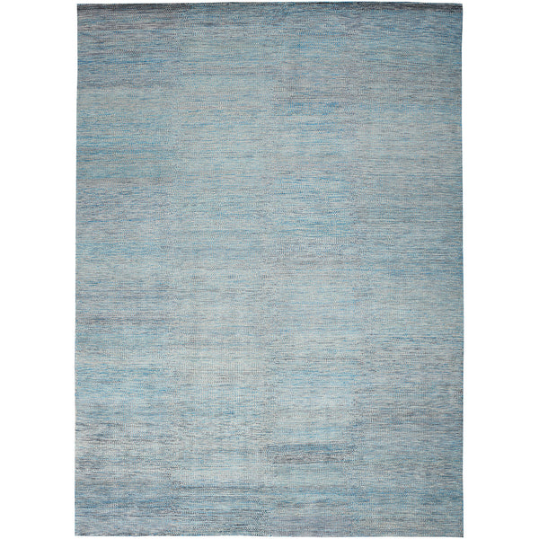 Modern rectangular area rug with a textured ombre pattern in blue.