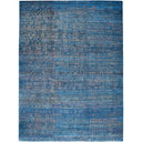 Abstract, textured surface in shades of blue with woven appearance.