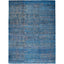 Abstract, textured surface in shades of blue with woven appearance.