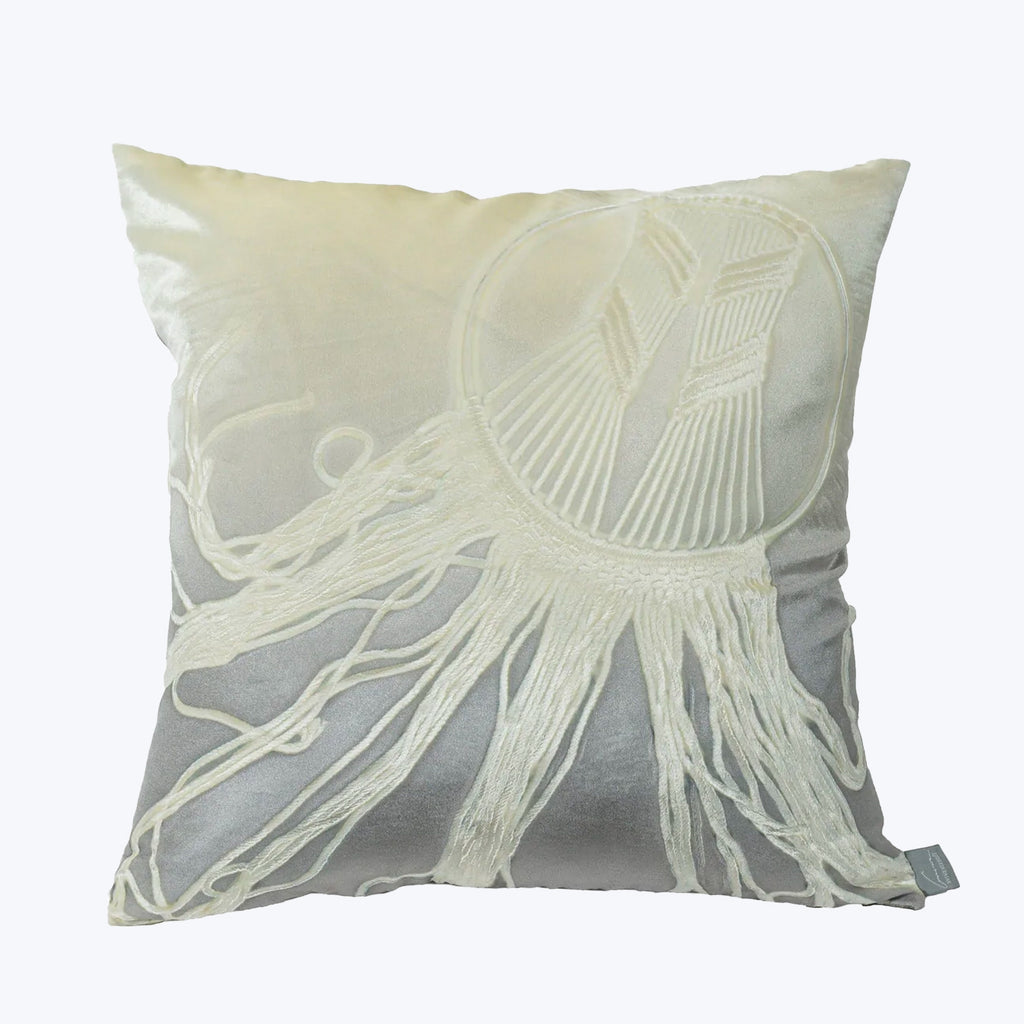 Decorative throw pillow with dual-tone, textured design and embroidery.