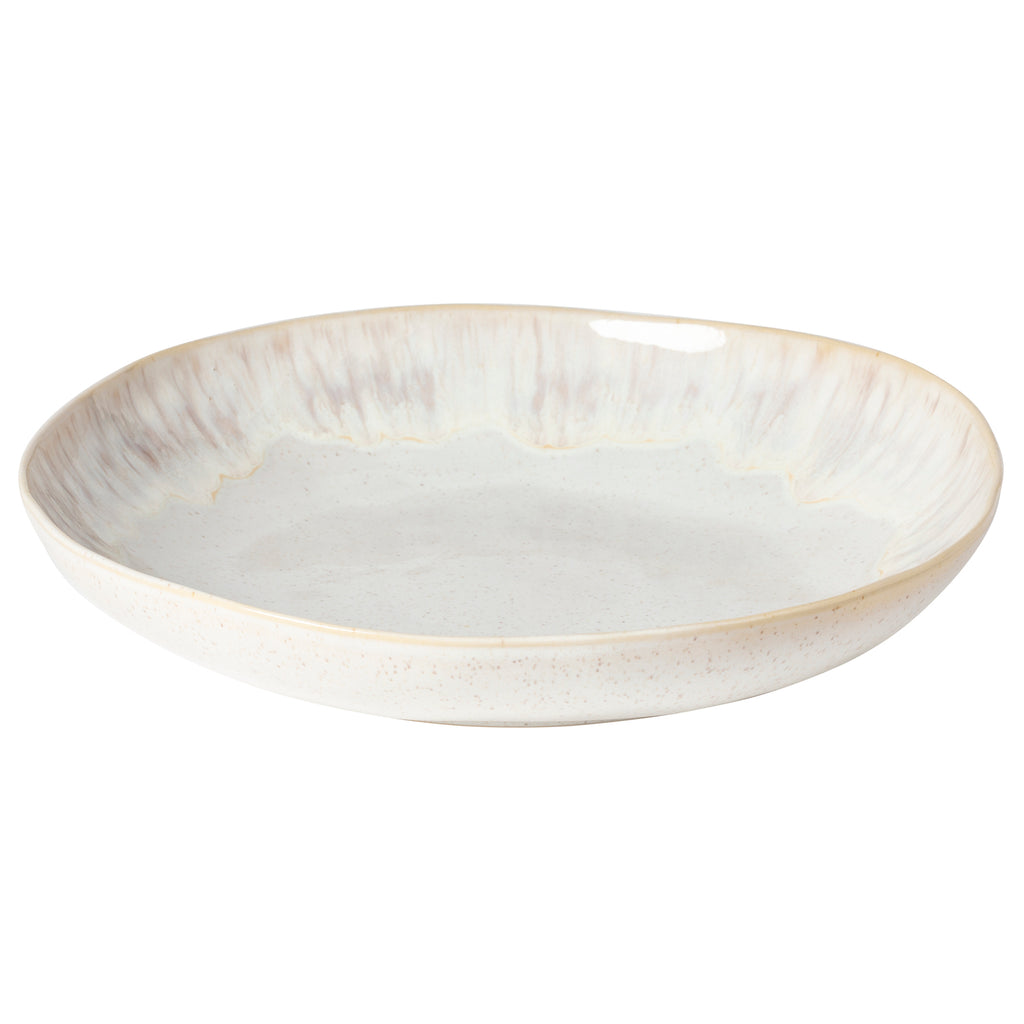 Elegant ceramic plate with rustic speckled design, perfect for serving