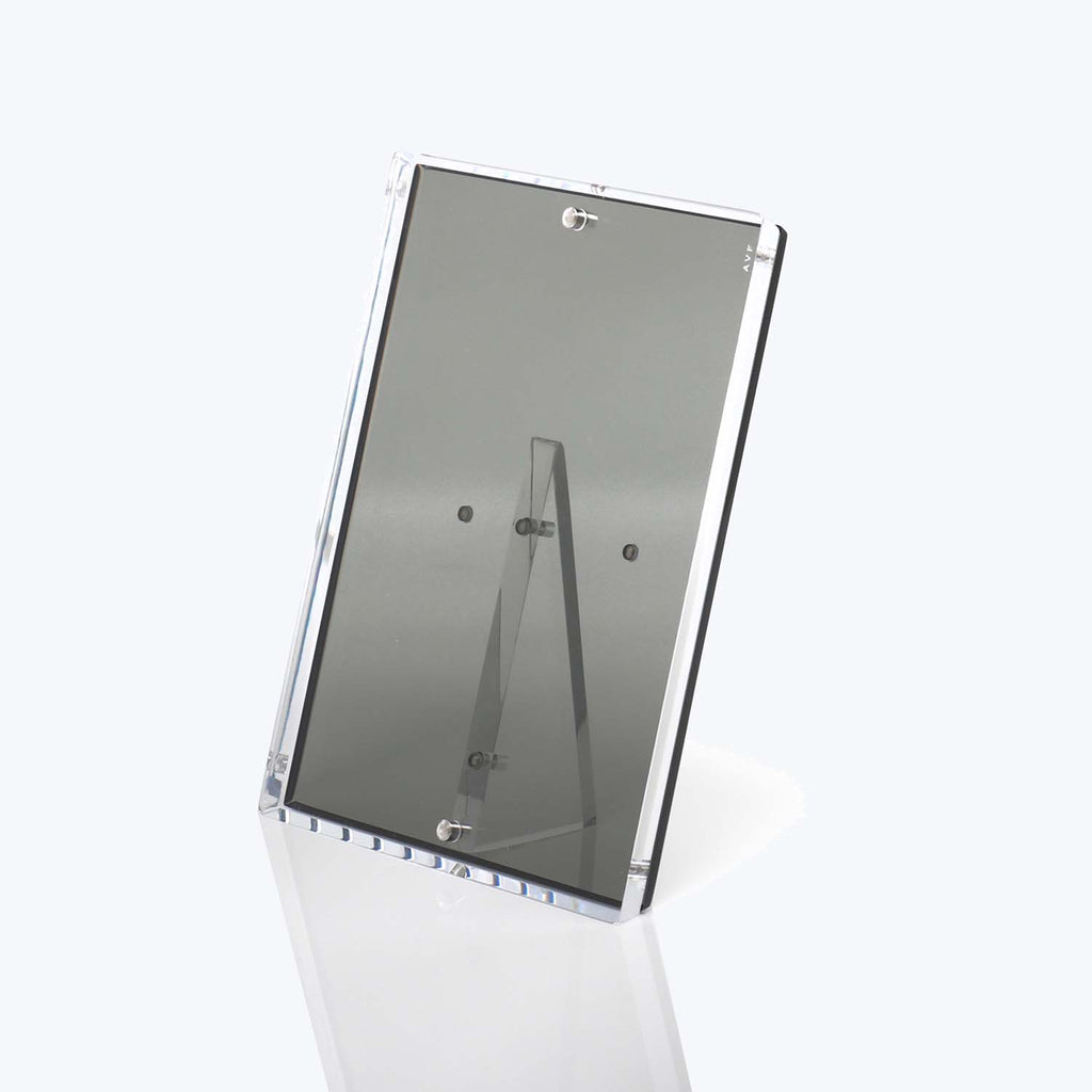 Simple and transparent acrylic holder for displaying signs and menus.