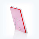 Sleek and modern pink acrylic award with solid red border.