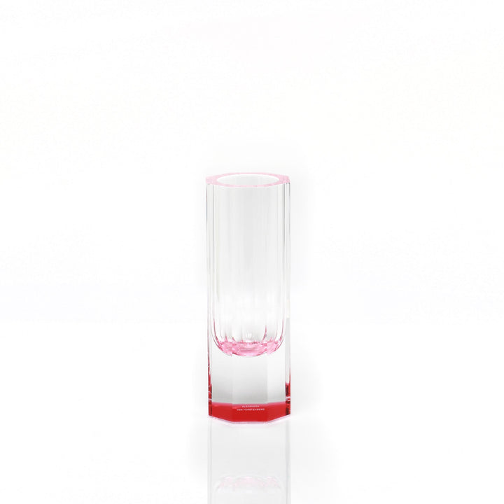 Minimalistic glass with a touch of pink adds elegant decor.