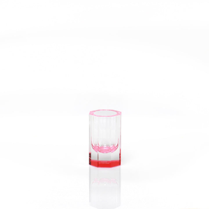 Minimalist glass design showcases a sleek red gradient bottom.