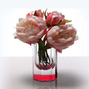 Exquisite pink peonies bloom in a glass vase with submerged stems.